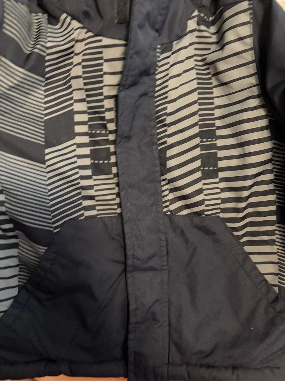 The Children's Place Navy Puffer Jacket with Bright Orange Lining